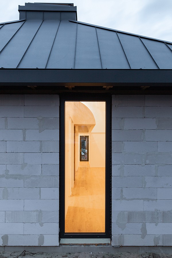 Exterior view of internal axis spanning through the building, studio substrata, Reinis Salins, Igors Malovickis