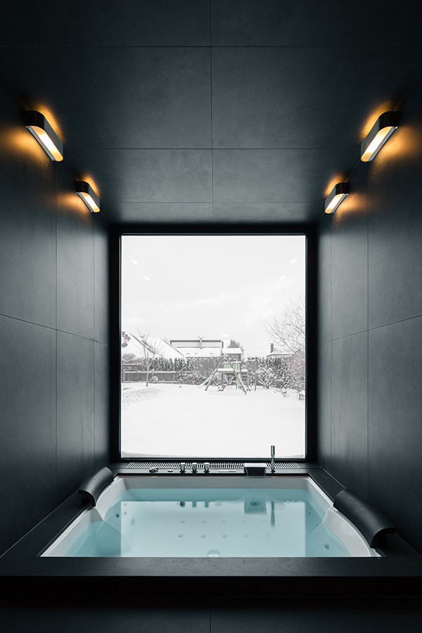 Interior view of the bathing area with a view towards the courtyard, studio substrata, Reinis Salins, Igors Malovickis